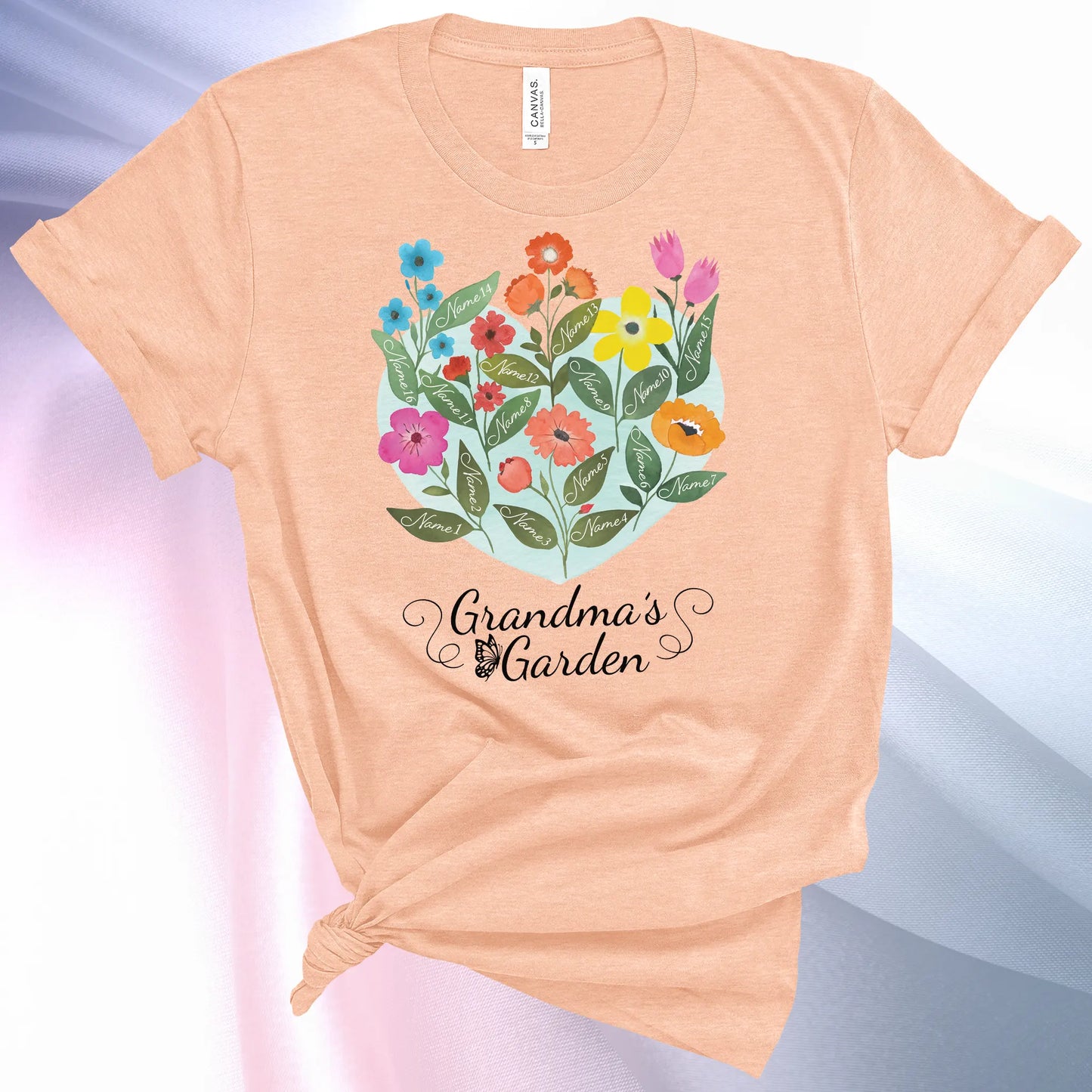Heather Peach colored Grandmas Garden T-Shirt for women, showcase up to 16 names on the leaves of beautiful flowers