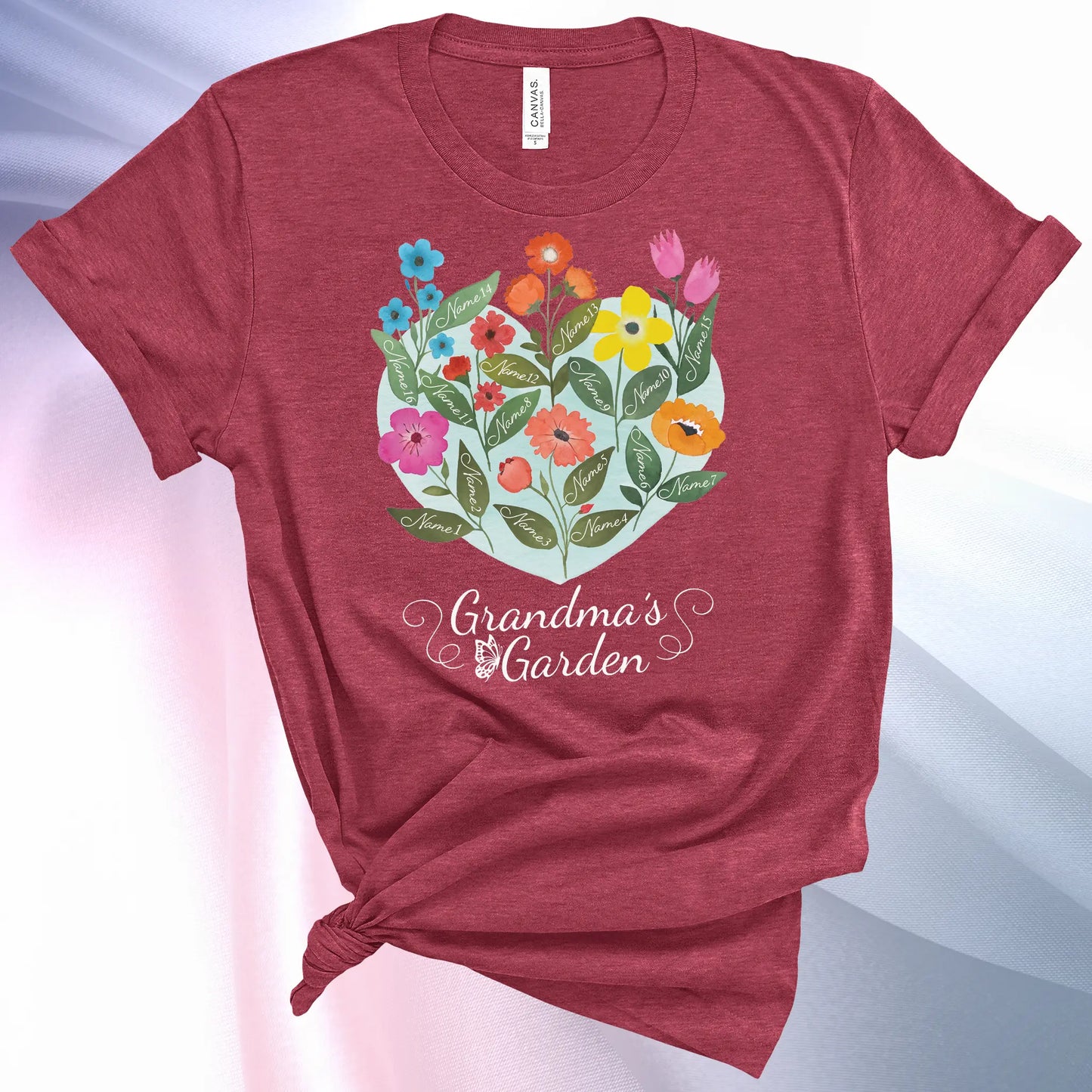 Heather Raspberry colored Grandmas Garden T-Shirt for women, showcase up to 16 names on the leaves of beautiful flowers