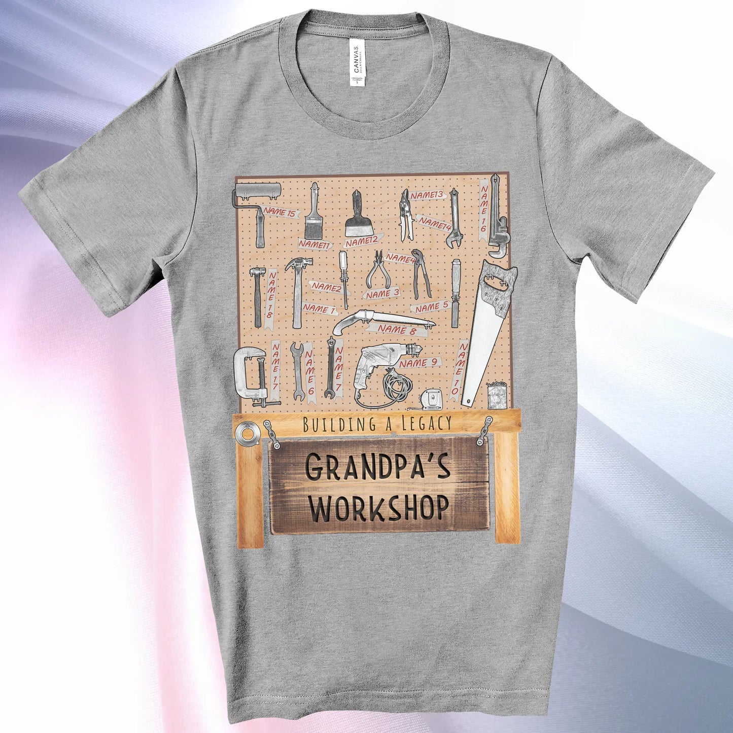 Athletic Heather colored Grandpa's Workshop T-Shirt —showcase up to 18 people or pets using hand tool labels on a pegboard