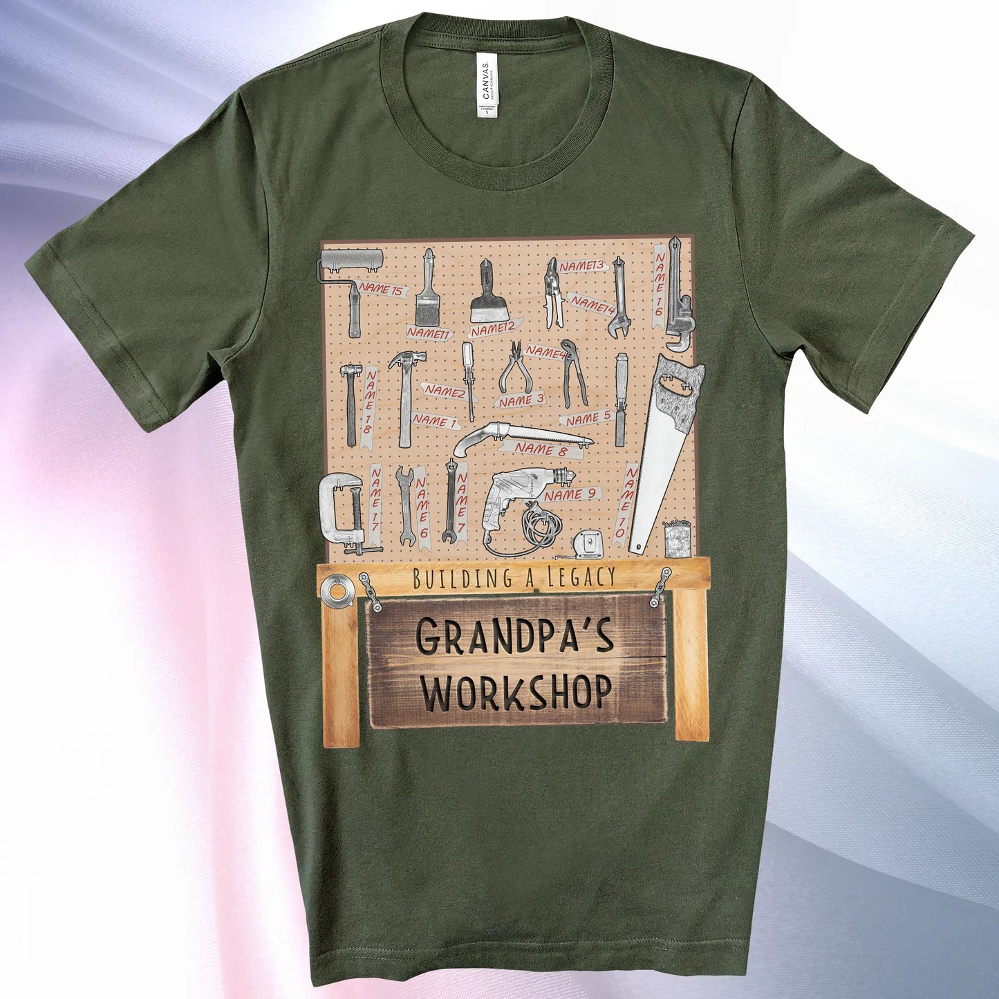 Military Green colored Grandpa's Workshop T-Shirt —showcase up to 18 people or pets using hand tool labels on a pegboard