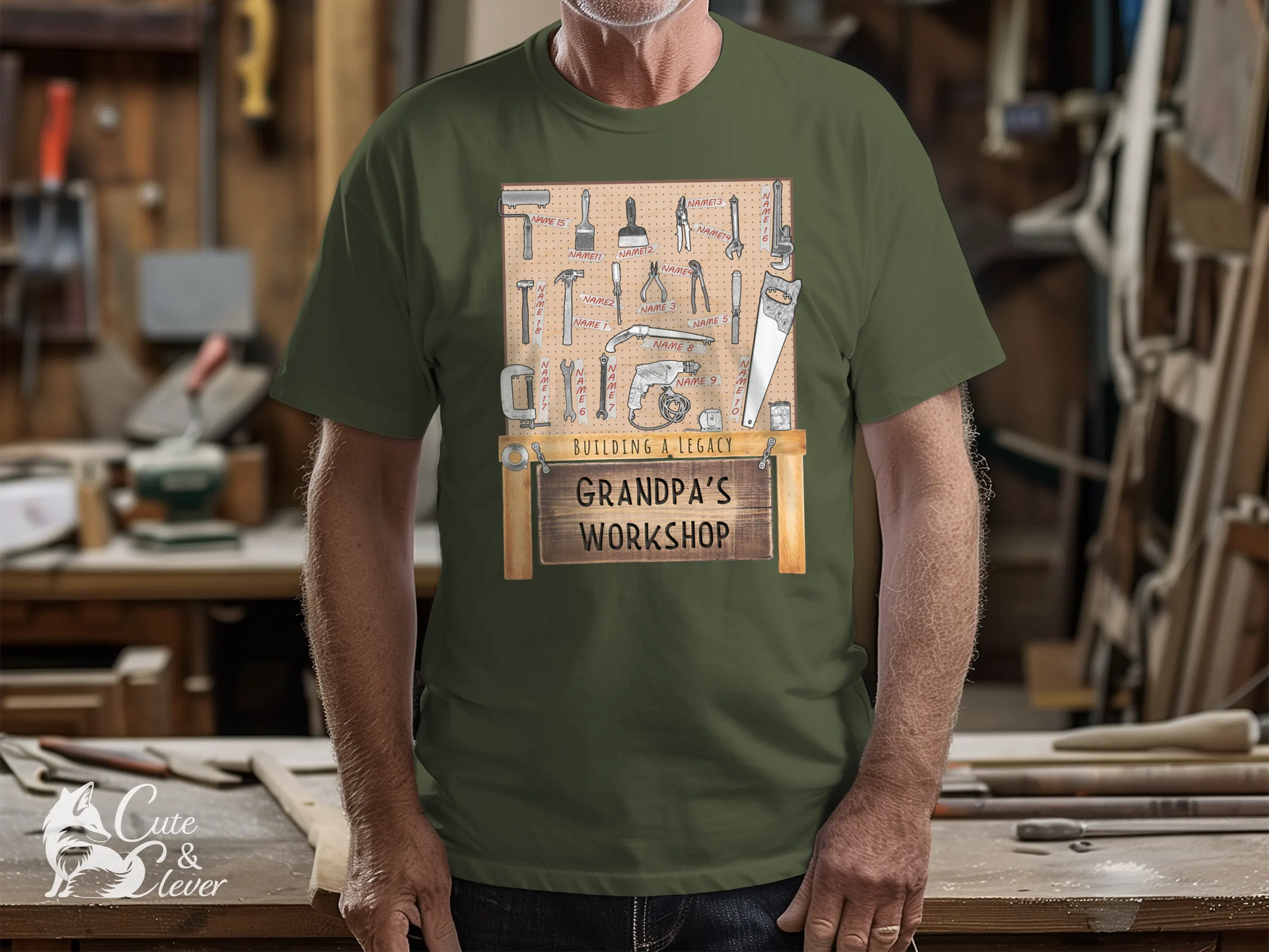 A grandpa stands in his workshop wearing a Military Green colored Grandpa's Workshop T-Shirt.