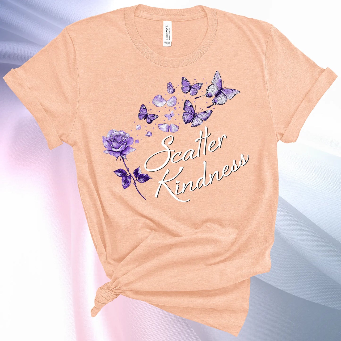 Heather Peach colored Scatter Kindness T-Shirt for women, radiate positive vibes and make your world a little brighter!