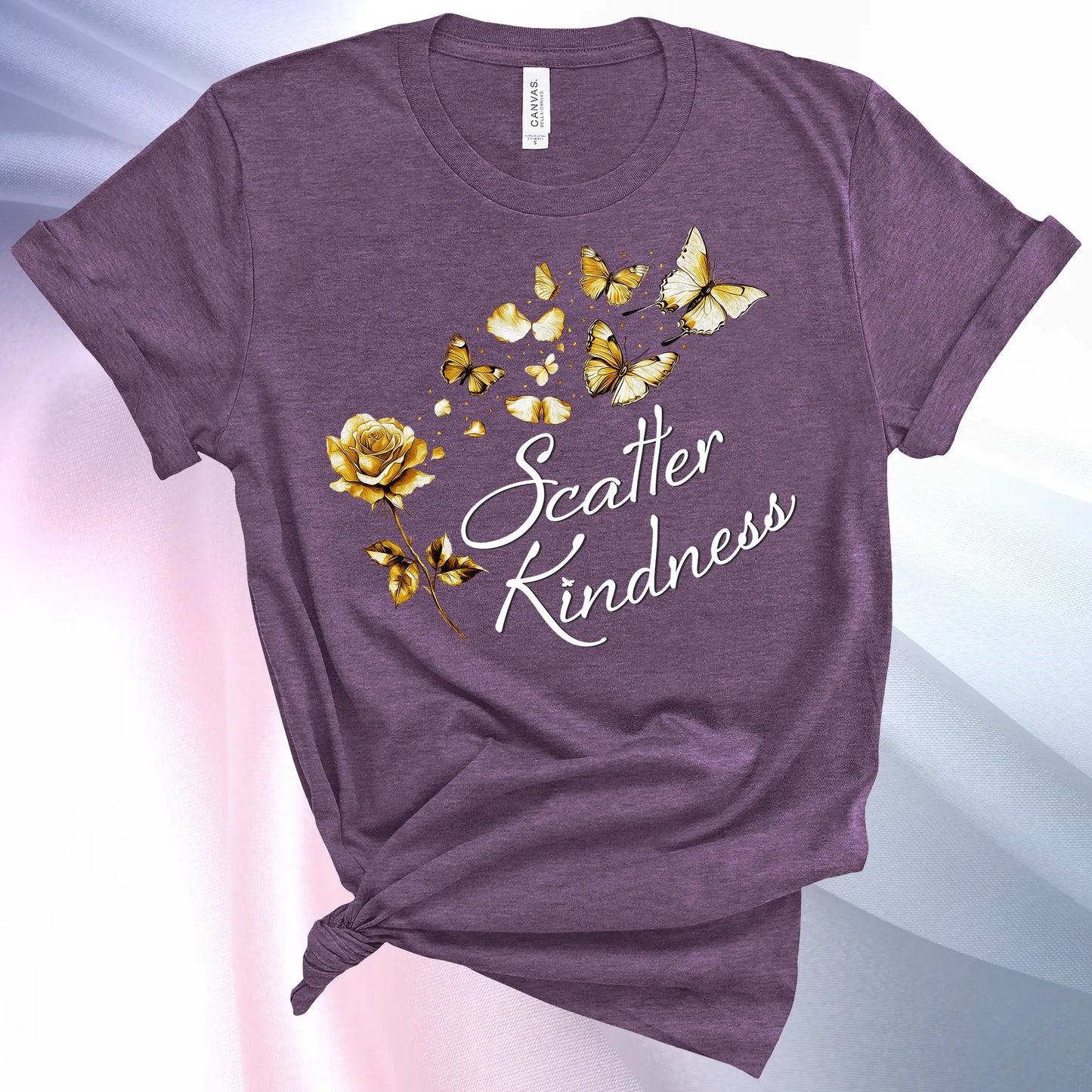 Heather Team Purple colored Scatter Kindness T-Shirt for women, radiate positive vibes and make your world a little brighter!