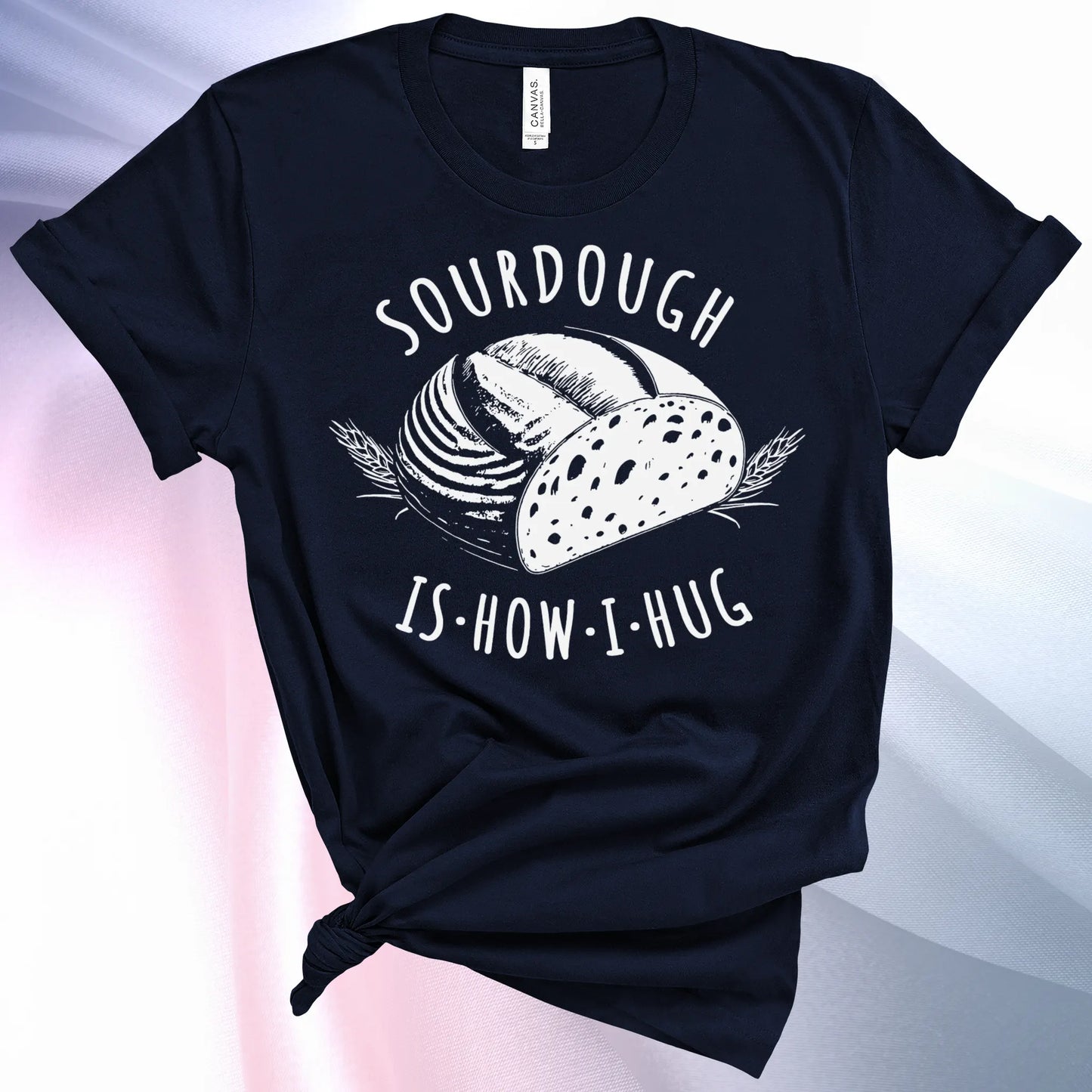 Navy colored Sourdough Hug T-Shirt featuring a loaf of sourdough and "Sourdough" above and "Is How I Hug" below